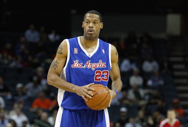 CHARLOTTE, NC - FEBRUARY 9:  Marcus Camby #23 of the Los Angeles Clippers holds the ball against the Charlotte Bobcats during the game at Time Warner Cable Arena on February 9, 2009 in Charlotte, North Carolina. NOTE TO USER: User expressly acknowledges and agrees that, by downloading and or using this photograph, User is consenting to the terms and conditions of the Getty Images License Agreement. (Photo by Streeter Lecka/Getty Images) 