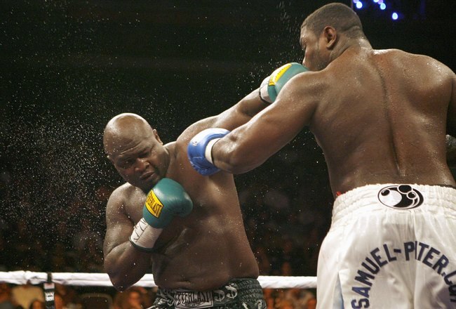 HOLLYWOOD, FL - JANUARY 06: James ' Lights Out' Toney throws a punch during a bout against Samuel 'Nigerian Nightmare' Peter in a WBC heavyweight title eliminator fight at the Hard Rock Hotel and Casino January 6, 2007 in Hollywood, Florida. (Photo by Marc Serota/Getty Images)