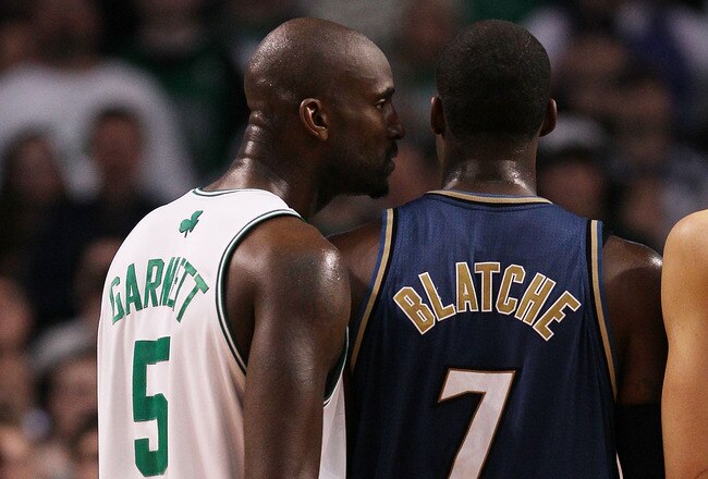 BOSTON - MARCH 07:  Kevin Garnett #5 of the Boston Celtics tries to intimidate Andray Blatche #7 of the Washington Wizards  on March 7, 2010 at the TD Garden in Boston, Massachusetts. The Celtics defeated the Wizards 86-83. NOTE TO USER: User expressly acknowledges and agrees that, by downloading and or using this photograph, User is consenting to the terms and conditions of the Getty Images License Agreement.  (Photo by Elsa/Getty Images)