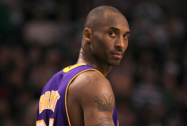 BOSTON - JANUARY 31:  Kobe Bryant  #24 the Los Angeles Lakers looks over his shoulder during the closing minutes of a game  against the Boston Celtics at the TD Garden on January 31, 2010 in Boston, Massachusetts.  The Lakers won 90-89. NOTE TO USER: User expressly acknowledges and agrees that, by downloading and or using this photograph, User is consenting to the terms and conditions of the Getty Images License Agreement. (Photo by Jim Rogash /Getty Images)