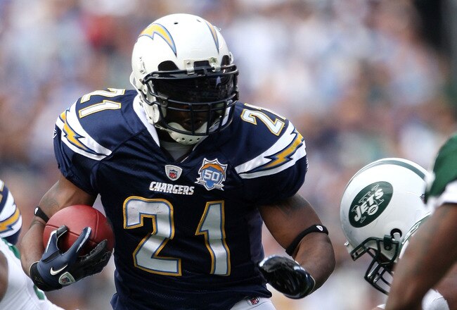 SAN DIEGO - JANUARY 17:  Running back LaDainian Tomlinson #21 of the San Diego Chargers runs with the ball against the New York Jets during the AFC Divisional Playoff Game at Qualcomm Stadium on January 17, 2010 in San Diego, California.  (Photo by Donald Miralle/Getty Images)