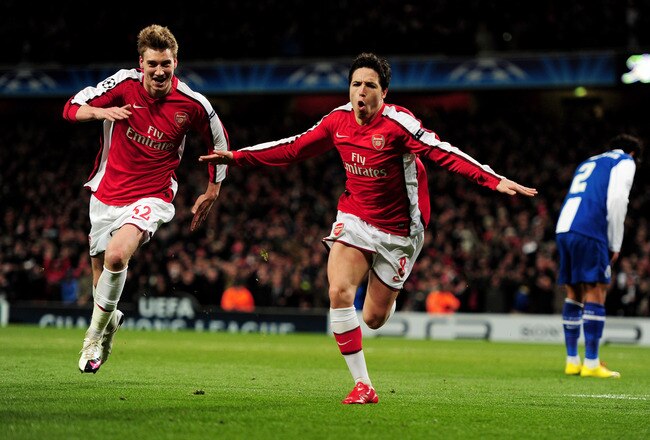 LONDON, ENGLAND - MARCH 09:  Samir Nasri (R) of Arsenal celebrates with teammate Nicklas Bendtner after scoring his team's third goal during the UEFA Champions League round of 16 match between Arsenal and FC Porto at the Emirates Stadium on March 9, 2010 in London, England.  (Photo by Mike Hewitt/Getty Images)