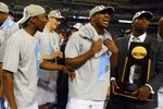 DETROIT - APRIL 06:  The North Carolina Tar Heels celebrate with the championship trophy after defeating the Michigan State Spartans 89-72 during the 2009 NCAA Division I Men's Basketball National Championship game at Ford Field on April 6, 2009 in Detroit, Michigan.  (Photo by Streeter Lecka/Getty Images)