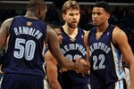 NEW ORLEANS - MARCH 03:  Zach Randolph #50, Mike Conley #11, Marc Gasol #33 congratulate Rudy Gay #22 of the Memphis Grizzlies after picking up a loose ball against the New Orleans Hornets at the New Orleans Arena on March 3, 2010 in New Orleans, Louisiana.  NOTE TO USER: User expressly acknowledges and agrees that, by downloading and/or using this Photograph, User is consenting to the terms and conditions of the Getty Images License Agreement.  (Photo by Chris Graythen/Getty Images)