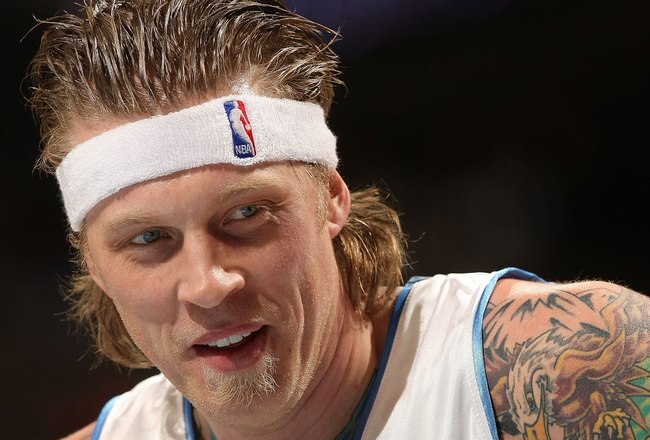 DENVER - JANUARY 13:  Chris Andersen #11 of the Denver Nuggets looks on against the Orlando Magic during NBA action at Pepsi Center on January 13, 2010 in Denver, Colorado. The Nuggets defeated the Magic 115-97. NOTE TO USER: User expressly acknowledges and agrees that, by downloading and/or using this Photograph, user is consenting to the terms and conditions of the Getty Images License Agreement.  (Photo by Doug Pensinger/Getty Images)