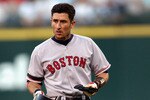 SEATTLE - AUGUST 13:  Shortstop Nomar Garciaparra #5 of the Boston Red Sox removes his helmet at the end of an inning during the MLB game against the Seattle Mariners on August 13, 2002 at Safeco Field in Seattle, Washington.  The Mariners won 10-3.  (Photo by Otto Greule Jr./Getty Images)