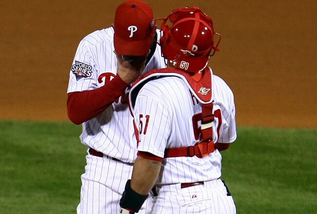 PHILADELPHIA - NOVEMBER 01:  (L-R) Brad Lidge #54 and Carlos Ruiz #51 of the Philadelphia Phillies talk on the mound in the top of the ninth inning against the New York Yankees in Game Four of the 2009 MLB World Series at Citizens Bank Park on November 1, 2009 in Philadelphia, Pennsylvania.  (Photo by Chris McGrath/Getty Images)