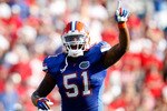 JACKSONVILLE, FL - OCTOBER 31:  Brandon Spikes #51 of the Florida Gators calls the defense against the Georgia Bulldogs at Jacksonville Municipal Stadium on October 31, 2009 in Jacksonville, Florida.  (Photo by Kevin C. Cox/Getty Images)