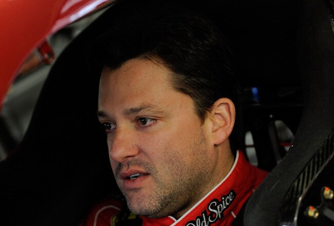 LAS VEGAS - FEBRUARY 27:  Tony Stewart, driver of the #14 Old Spice/Office Depot Chevrolet, sits in his car in the garage during practice for the NASCAR Sprint Cup Series Shelby American at Las Vegas Motor Speedway on February 27, 2010 in Las Vegas, Nevada.  (Photo by Rusty Jarrett/Getty Images for NASCAR)