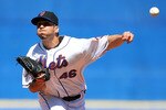 PORT ST. LUCIE, FL - MARCH 07:  Starting pitcher Oliver Perez #46 of the New York Mets pitches against the Washington Nationals at Tradition Field on March 7, 2010 in Port St. Lucie, Florida.  (Photo by Doug Benc/Getty Images)