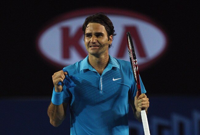 MELBOURNE, AUSTRALIA - JANUARY 31:  Roger Federer of Switzerland celebrates championship point in his men's final match against Andy Murray of Great Britain during day fourteen of the 2010 Australian Open at Melbourne Park on January 31, 2010 in Melbourne, Australia.  (Photo by Quinn Rooney/Getty Images)