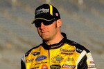 ATLANTA - MARCH 05:  Paul Menard, driver of the #98 Menard's Ford, walks down pit road during qualifying for the NASCAR Sprint Cup Series Kobalt Tools 500 at Atlanta Motor Speedway on March 5, 2010 in Hampton, Georgia.  (Photo by John Harrelson/Getty Images)