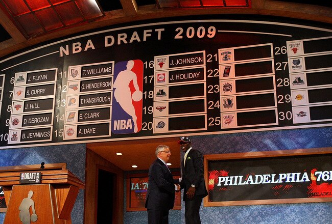 NEW YORK - JUNE 25:  NBA Commissioner David Stern poses for a photograph with the seventeenth overall draft pick by the Philadelphia 76ers,  Jrue Holiday during the 2009 NBA Draft at the Wamu Theatre at Madison Square Garden June 25, 2009 in New York City. NOTE TO USER: User expressly acknowledges and agrees that, by downloading and/or using this Photograph, User is consenting to the terms and conditions of the Getty Images License Agreement.  (Photo by Jim McIsaac/Getty Images)