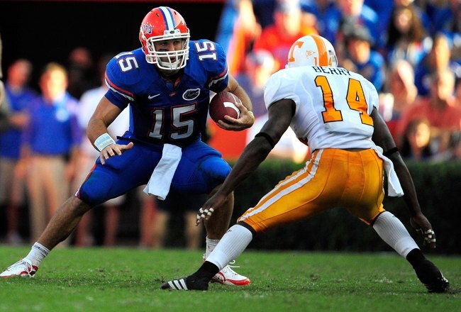 GAINESVILLE, FL - SEPTEMBER 19:  Tim Tebow #15 of the Florida Gators is cornered by Eric Berry #14 of the Tennessee Volunteers during the game at Ben Hill Griffin Stadium on September 19, 2009 in Gainesville, Florida.  (Photo by Sam Greenwood/Getty Images)