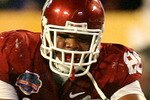 MIAMI - JANUARY 08:  Tim Tebow #15 of the Florida Gators is tackled by Gerald McCoy #93 of the Oklahoma Sooners as Maurkice Pouncey #56 of Florida flips over Tebow during the FedEx BCS National Championship game at Dolphin Stadium on January 8, 2009 in Miami, Florida.  (Photo by Doug Benc/Getty Images)