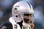 OAKLAND, CA - NOVEMBER 15:  JaMarcus Russell #2 of the Oakland Raiders stands on the sidelines after being taken out of their game against the Kansas City Chiefs at Oakland-Alameda County Coliseum on November 15, 2009 in Oakland, California.  (Photo by Ezra Shaw/Getty Images)
