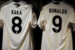 MADRID, SPAIN - MARCH 11:  Shirts of Real Madrid star players hang inside the fanshop on the day after Real Madrid's UEFA Champions League aggregate defeat against Lyon at the Estadio Santiago Bernabeu on March 11, 2010 in Madrid, Spain.  (Photo by Jasper Juinen/Getty Images)