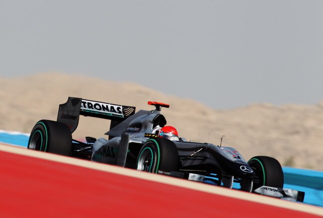 SAKIR, BAHRAIN - MARCH 12:  Michael Schumacher of Germany and Mercedes GP drives during practice for the Bahrain Formula One Grand Prix at the Bahrain International Circuit on March 12, 2010 in Sakir, Bahrain.  (Photo by Mark Thompson/Getty Images)
