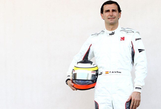 SAKIR, BAHRAIN - MARCH 11:  Pedro de la Rosa of Spain and BMW Sauber attends the drivers official portrait session during previews to the Bahrain Formula One Grand Prix at the Bahrain International Circuit on March 11, 2010 in Sakir, Bahrain.  (Photo by Paul Gilham/Getty Images)