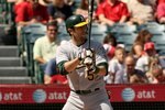 ANAHEIM, CA - SEPTEMBER 27:  Nomar Garciaparra #5 of the Oakland Athletics bats against the Los Angeles Angels of Anaheim on September 27, 2009 at Angel Stadium in Anaheim, California.   The Angels won 7-4.  (Photo by Stephen Dunn/Getty Images)