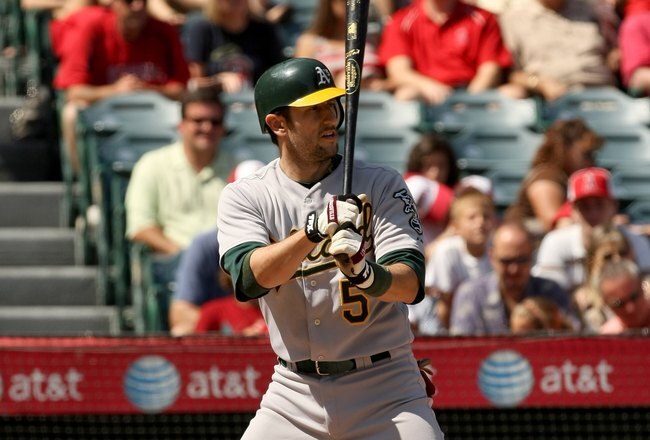 ANAHEIM, CA - SEPTEMBER 27:  Nomar Garciaparra #5 of the Oakland Athletics bats against the Los Angeles Angels of Anaheim on September 27, 2009 at Angel Stadium in Anaheim, California.   The Angels won 7-4.  (Photo by Stephen Dunn/Getty Images)