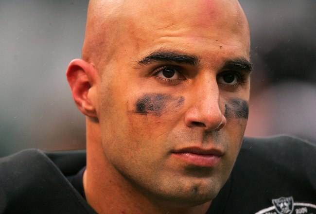 OAKLAND, CA - DECEMBER 13:  Bruce Gradkowski #5 of the Oakland Raiders stands on the sideline during their game against the Washington Redskins at Oakland-Alameda County Coliseum on December 13, 2009 in Oakland, California.  (Photo by Ezra Shaw/Getty Images)
