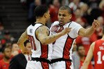 LAS VEGAS - MARCH 11:  Tre'Von Willis #33 and Steve Jones #20 of the UNLV Rebels bump chests during their quarterfinal game of the Conoco Mountain West Conference Basketball tournament against the Utah Utes at the Thomas & Mack Center March 11, 2010 in Las Vegas, Nevada. UNLV won 73-61.  (Photo by Ethan Miller/Getty Images)