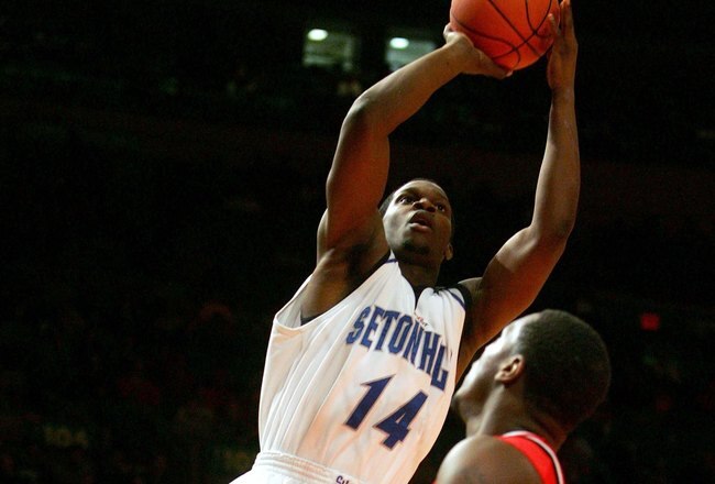 NEW YORK - MARCH 08:  Brian Laing #14 of the Seton Hall Pirates shoots over Ollie Bailey #40 of the Rutgers Scarlet Knights during the first round of the Big East Men's Basketball Championships at Madison Square Garden on March 8, 2006 in New York City.  (Photo by Jim McIsaac/Getty Images)