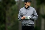 PEBBLE BEACH, CA - FEBRUARY 12:  New England Patriots quarterback Tom Brady waits on the 10th green during the second round of the AT&T Pebble Beach National Pro-Am at Spyglass Hill Golf Course on February 12 2010 in Pebble Beach, California. (Photo by Stephen Dunn/Getty Images)