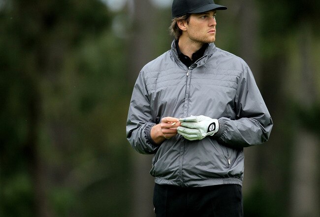 PEBBLE BEACH, CA - FEBRUARY 12:  New England Patriots quarterback Tom Brady waits on the 10th green during the second round of the AT&T Pebble Beach National Pro-Am at Spyglass Hill Golf Course on February 12 2010 in Pebble Beach, California. (Photo by Stephen Dunn/Getty Images)