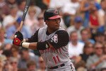 CHICAGO - JULY 21:  Barry Larkin #11 of the Cincinnati Reds waits for a Chicago Cubs pitch during a game at Wrigley Field on July 21, 2004 in Chicago, Illinois. The Cubs defeated the Reds 5-4. (Photo by Jonathan Daniel/Getty Images)