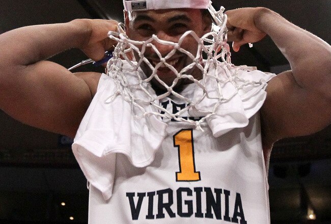 NEW YORK - MARCH 13:  Da'Sean Butler #1 of the West Virginia Mountaineers cuts down the net after defeating the Georgetown Hoyas in the championship of the 2010 NCAA Big East Tournament at Madison Square Garden on March 13, 2010 in New York City.  (Photo by Jim McIsaac/Getty Images)