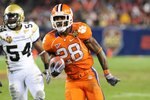 TAMPA, FL - NOVEMBER 28: Running back C. J. Spiller #28 of the Clemson Tigers rushes upfield against the Georgia Tech Yellow Jackets in the 2009 ACC Football Championship Game December 5, 2009 at Raymond James Stadium in Tampa, Florida.  (Photo by Al Messerschmidt/Getty Images) 