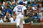 CHICAGO - AUGUST 28: Right fielder Milton Bradley #21 of the Chicago Cubs jogs off of the field after scoring in the first inning against the New York Mets at Wrigley Field on August 28, 2009 in Chicago, Illinois. (Photo by Jonathan Daniel/Getty Images)