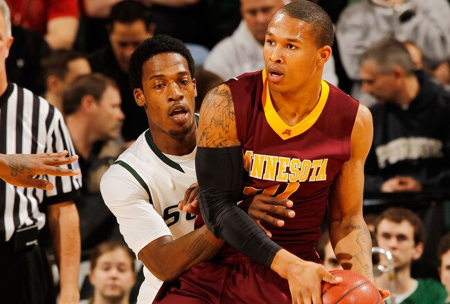 INDIANAPOLIS - MARCH 12:  Guard Lawrence Westbrook #20 of the Minnesota Golden Gophers controls the ball as guard Durrell Summers #15 of the the Michigan State Spartans defends during the quarterfinals of the Big Ten Men's Basketball Tournament at Conseco Fieldhouse on March 12, 2010 in Indianapolis, Indiana.  (Photo by Jonathan Daniel/Getty Images)
