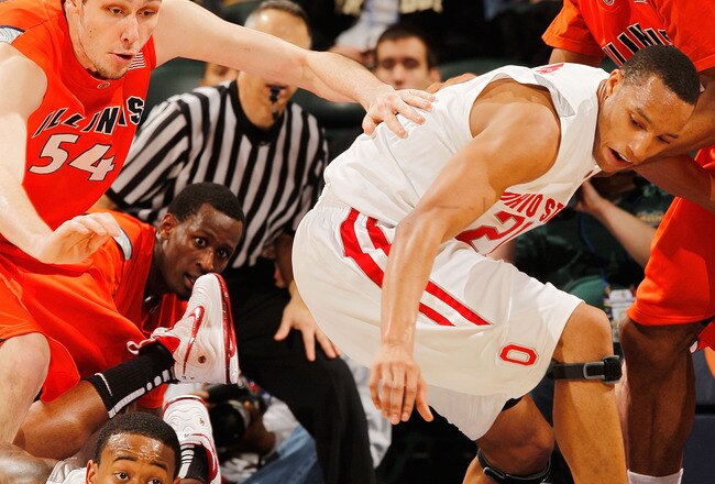 INDIANAPOLIS - MARCH 13:  Guards Evan Turner #21 and David Lighty #23 of the Ohio State Buckeyes go after a loose ball during their game against the Illinois Fighting Illini in the semifinals of the Big Ten Men's Basketball Tournament at Conseco Fieldhouse on March 13, 2010 in Indianapolis, Indiana.  (Photo by Jonathan Daniel/Getty Images)