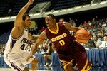 ANAHEIM, CA - NOVEMBER 27: Al Nolen #0 of the Minnesota Gophers drives against T.J. Campbell  #44 of the Portland Pilots at the 76 Classic at Anaheim Convention Center on November 27, 2009 in Anaheim, California. (Photo by Stephen Dunn/Getty Images)