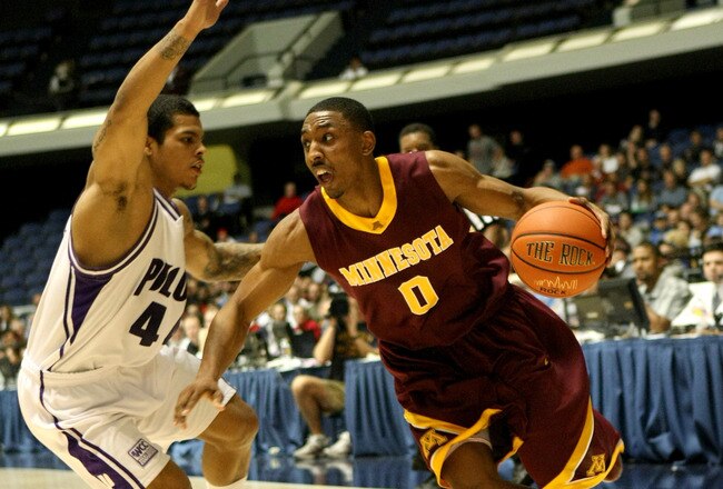ANAHEIM, CA - NOVEMBER 27: Al Nolen #0 of the Minnesota Gophers drives against T.J. Campbell  #44 of the Portland Pilots at the 76 Classic at Anaheim Convention Center on November 27, 2009 in Anaheim, California. (Photo by Stephen Dunn/Getty Images)