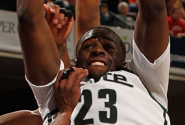 INDIANAPOLIS - MARCH 12:  Forward Draymond Green #23 of the Michigan State Spartans grabs a rebound against the Minnesota Golden Gophers during overtime of the quarterfinals in the Big Ten Men's Basketball Tournament at Conseco Fieldhouse on March 12, 2010 in Indianapolis, Indiana.  (Photo by Jonathan Daniel/Getty Images)