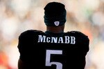 PHILADELPHIA - NOVEMBER 29:  Donovan McNabb #5 of the Philadelphia Eagles watches the game from the sidelines against the Washington Redskins during their game at Lincoln Financial Field on November 29, 2009 in Philadelphia, Pennsylvania.  (Photo by Al Bello/Getty Images)