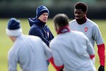 LONDON COLNEY, ENGLAND - MARCH 08:  Arsenal manager Arsene Wenger looks on during an Arsenal training session in preparation for the Champions League second leg match between Arsenal and Porto at the Arsenal training ground on March 8, 2010 in London Colney, England.  (Photo by Mike Hewitt/Getty Images)