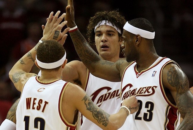 CLEVELAND - MAY 20: Delonte West #13, Anderson Varejao #17 and LeBron James #23 of the Cleveland Cavaliers react after a play against the Orlando Magic in Game One of the Eastern Conference Finals during the 2009 Playoffs at Quicken Loans Arena on May 20, 2009 in Cleveland, Ohio. NOTE TO USER: User expressly acknowledges and agrees that, by downloading and or using this photograph, User is consenting to the terms and conditions of the Getty Images License Agreement  (Photo by Elsa/Getty Images)