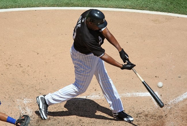 CHICAGO - JUNE 28: Jermaine Dye #23 of the Chicago White Sox hits the ball against the Chicago Cubs on June 28, 2009 at U.S. Cellular Field in Chicago, Illinois. The White Sox defeated the Cubs 6-0. (Photo by Jonathan Daniel/Getty Images) 