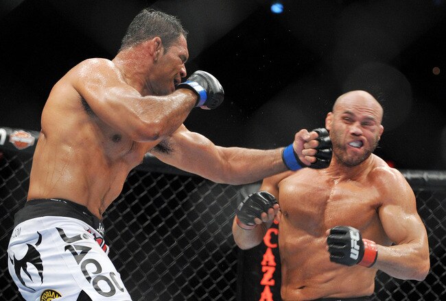 PORTLAND, OR - AUGUST 29:  UFC fighter Antonio Nogueira (L) battles UFC fighter Randy Couture (R) during their Heavyweight bout at UFC 102:  Couture vs. Nogueira at the Rose Garden Arena on August 29, 2009 in Portland, Oregon.  (Photo by Jon Kopaloff/Getty Images)