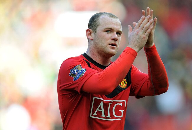 MANCHESTER, ENGLAND - MARCH 14: Wayne Rooney of Manchester United applauds the fans after the Barclays Premier League match between Manchester United and Fulham at Old Trafford on March 14, 2010 in Manchester, England.  (Photo by Michael Regan/Getty Images)