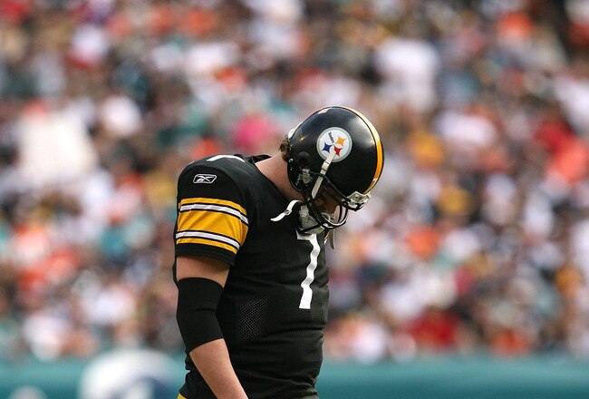MIAMI - JANUARY 03:  Quarterback Ben Roethlisberger #7 of the Pittsburgh Steelers walks back to the huddle after injuring his shoulder in the fourth quarter against the Miami Dolphins at Land Shark Stadium on January 3, 2010 in Miami, Florida. The Steelers defeated the Dolphins 30-24.  (Photo by Doug Benc/Getty Images)