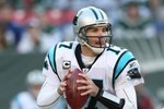 EAST RUTHERFORD, NJ - NOVEMBER 29:  Jake Delhomme #17 of the Carolina Panthers passes against the New York Jets at Giants Stadium on November 29, 2009 in East Rutherford, New Jersey.  (Photo by Nick Laham/Getty Images)