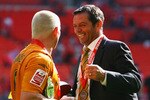 LONDON - MAY 24:  Dean Windass of Hull City celebrates victory with manager Phil Brown following the Coca Cola Championship Playoff Final match between Hull City and Bristol City at Wembley Stadium on May 24, 2008 in London, England.  (Photo by Jamie McDonald/Getty Images)
