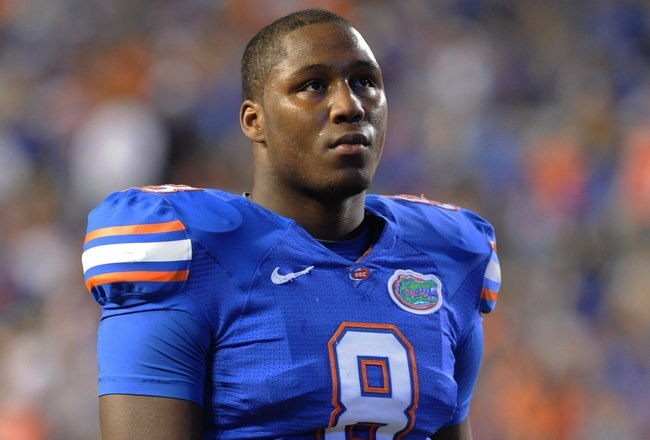 GAINESVILLE, FL - NOVEMBER 7: Defensive end Carlos Dunlap #8  of the Florida Gators sets on defense against the Vanderbilt Commodores  on November 7, 2009 at Ben Hill Griffin Stadium in Gainesville, Florida.  (Photo by Al Messerschmidt/Getty Images) 