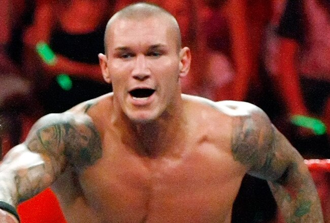 LAS VEGAS - AUGUST 24:  Wrestlers Triple H (L) and Randy Orton compete during the WWE Monday Night Raw show at the Thomas & Mack Center August 24, 2009 in Las Vegas, Nevada.  (Photo by Ethan Miller/Getty Images)
